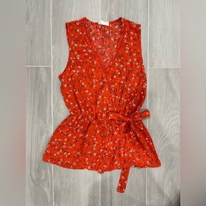 Sienna Sky Sleeveless Peplum Faux Wrap Blouse